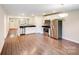 Bright eat-in kitchen features stainless steel appliances and a seamless flow to the living spaces at 115 Dove Sw Ave, Concord, NC 28025