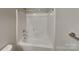 A bathtub and shower combination with white fixtures and ample space at 115 Dove Sw Ave, Concord, NC 28025