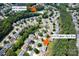 Aerial view of home in quiet neighborhood featuring pool and clubhouse at 12341 Mcallister Park Dr, Charlotte, NC 28277