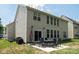 Exterior view of the home's backyard with a patio and space for outdoor activities at 12341 Mcallister Park Dr, Charlotte, NC 28277