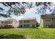 Spacious backyard features green grass and a patio, ideal for relaxation and entertainment at 12341 Mcallister Park Dr, Charlotte, NC 28277