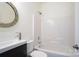 Bathroom with modern sink, tiled shower and tub combination, and contemporary fixtures at 12341 Mcallister Park Dr, Charlotte, NC 28277