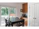 Dining area with sliding glass door leading to outdoor space, perfect for entertaining at 12341 Mcallister Park Dr, Charlotte, NC 28277