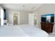 This bedroom features a serene space and includes an ensuite bathroom with shower and walk-in closet at 12341 Mcallister Park Dr, Charlotte, NC 28277