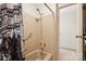 A bathroom featuring a shower and a shower curtain with a city pattern at 1300 Reece Rd # 305, Charlotte, NC 28209