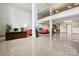 Spacious lobby featuring pink sofas, a shiny terrazzo floor, and modern design at 1300 Reece Rd # 305, Charlotte, NC 28209