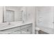 This bathroom features a double vanity, and a shower and tub at 1339 37Th Avenue Ne Ln, Hickory, NC 28601