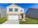 Charming two-story home featuring a brick and siding exterior, attached garage, and well-manicured lawn at 1339 37Th Avenue Ne Ln, Hickory, NC 28601