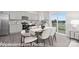 Open kitchen and dining area filled with natural light, stainless appliances, and a view of the outdoors at 1339 37Th Avenue Ne Ln, Hickory, NC 28601