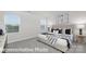The main bedroom has a large window, stylish furniture, and great decor at 1339 37Th Avenue Ne Ln, Hickory, NC 28601