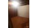 Unfinished basement features bare stud walls, concrete floor and open ceiling with exposed beams at 1628 Cecelia Dr, Gastonia, NC 28054