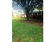 Charming one-story brick home with a large tree in the front yard at 1628 Cecelia Dr, Gastonia, NC 28054