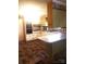 Retro kitchen with white cabinets, laminate countertops, and appliances at 1628 Cecelia Dr, Gastonia, NC 28054
