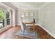 Bright office features neutral walls and warm wood floors at 18618 Rollingdale Ln, Davidson, NC 28036