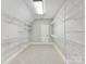A walk-in closet with shelving that runs floor to ceiling at 18618 Rollingdale Ln, Davidson, NC 28036