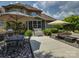 Back patio with dining and lounging areas adjacent to a screened porch at 213 Cowboys Cir, Rock Hill, SC 29732
