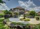 Charming backyard with fountain, patio seating, and manicured greenery at 213 Cowboys Cir, Rock Hill, SC 29732