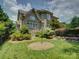 Well-maintained backyard with lush lawn and tasteful landscaping at 213 Cowboys Cir, Rock Hill, SC 29732