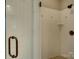 Bathroom with a white-tiled walk-in shower and bronze fixtures at 213 Cowboys Cir, Rock Hill, SC 29732