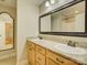 Spacious bathroom featuring double sinks and vanity with granite countertops and a decorative mirror at 213 Cowboys Cir, Rock Hill, SC 29732