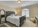 Bedroom with a neutral color palette, large window, and furnishings at 213 Cowboys Cir, Rock Hill, SC 29732
