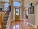 Grand foyer with hardwood floors, staircase, and elegant doorway at 213 Cowboys Cir, Rock Hill, SC 29732