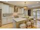 Bright kitchen with a large island, stainless steel appliances, and open floor plan at 213 Cowboys Cir, Rock Hill, SC 29732