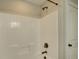Tiled shower featuring bronze hardware and a built-in bench at 213 Cowboys Cir, Rock Hill, SC 29732