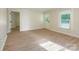 Bedroom featuring wood-look flooring, a glass panel door and lots of light at 2414 Lane St, Kannapolis, NC 28083