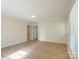 Bedroom with wood-look flooring and lots of light from a large window at 2414 Lane St, Kannapolis, NC 28083
