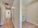 Recently remodeled hallway is bright and leads to the laundry room at 2414 Lane St, Kannapolis, NC 28083