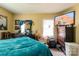 Spacious bedroom with a dresser, natural lighting, and a relaxed setting at 3037 Marlowe Ave, Charlotte, NC 28208