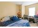 Bedroom with a comfortable chair and a window at 3037 Marlowe Ave, Charlotte, NC 28208