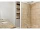 Elegant bathroom featuring a tiled shower with modern fixtures and granite counters at 308 Davis Park Rd, Gastonia, NC 28052