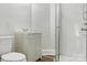 Modern bathroom featuring a vanity with cabinet storage, and a glass enclosed shower at 308 Davis Park Rd, Gastonia, NC 28052