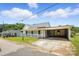 Charming home with a covered carport, inviting porch, and well-maintained lawn at 310 Sidney Johnson St, Fort Mill, SC 29715