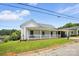 Beautifully maintained home with a covered carport and a cozy front porch at 310 Sidney Johnson St, Fort Mill, SC 29715