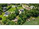 Aerial view of the house near the lake and other homes at 313 Sunset View Ct, York, SC 29745
