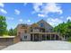 Back of house, featuring an outdoor entertainment area with a golf cart and outdoor tv at 313 Sunset View Ct, York, SC 29745