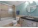 Well-maintained bathroom featuring a shower with glass door, and granite countertops at 313 Sunset View Ct, York, SC 29745