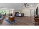 Bedroom with a bed, desk, a large window, and hardwood flooring at 313 Sunset View Ct, York, SC 29745