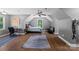 Bedroom with desk, futon, neutral walls, and light wood floors at 313 Sunset View Ct, York, SC 29745