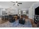 Open concept living room featuring a view into the kitchen and dining area at 313 Sunset View Ct, York, SC 29745