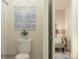 Bathroom with toilet next to an open doorway leading into a bedroom at 3823 Horsham St, Indian Land, SC 29707