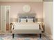 Comfortable bedroom features a padded headboard, matching side tables, and accent rug at 3823 Horsham St, Indian Land, SC 29707