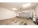 A spacious garage has a white door and concrete floors at 4128 River Run Cir, Hickory, NC 28602