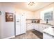 Bright kitchen boasts white cabinets, stainless steel appliances, and ample counter space at 4128 River Run Cir, Hickory, NC 28602