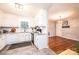 Charming kitchen featuring white cabinetry, granite counters, and stainless steel appliances at 4128 River Run Cir, Hickory, NC 28602