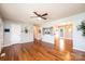 Spacious living room with hardwood floors, ceiling fan, and plenty of natural light at 4128 River Run Cir, Hickory, NC 28602