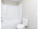 Modern bathroom featuring a clean white bathtub with shower and a new toilet at 426 Williamson St, Rock Hill, SC 29730